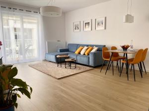 Apartament Nadmorski Kołobrzeg II的休息区