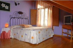 卡萨科洛姆乡村酒店客房内的一张或多张床位