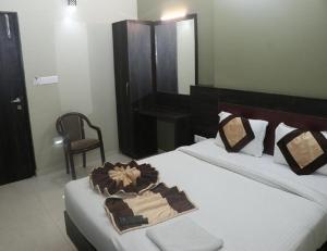 Hotel Pratap Iinternational客房内的一张或多张床位