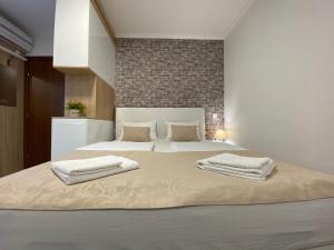 Apartments & Rooms Mostar Story客房内的一张或多张床位