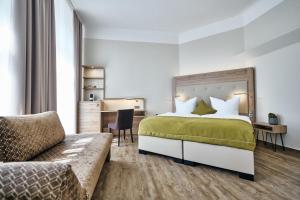 Lounge-Hotel Seeterrassen客房内的一张或多张床位