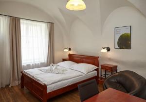维塔维诺博物馆酒店客房内的一张或多张床位