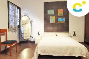 Casa Canaria Beautiful Home in Las Canteras客房内的一张或多张床位