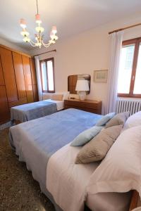 威尼斯生活酒店客房内的一张或多张床位