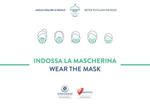 拉帕洛吉里奥斯尔酒店的一张为印度尼西亚人制作的海报,上面戴面具