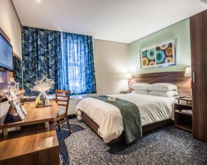 Town Lodge Gaborone客房内的一张或多张床位