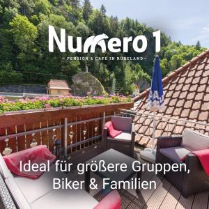 鲁贝兰德Numero1-Pension und Cafe的带有屋顶的阳台的杂志封面