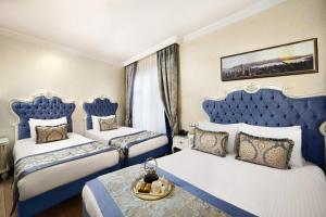奥雅苏丹酒店客房内的一张或多张床位