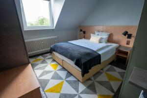 吕登沙伊德 斯塔德酒店客房内的一张或多张床位