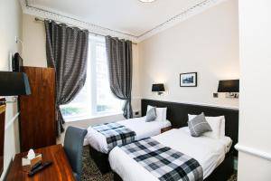 Kelvingrove Hotel - Sauchiehall St客房内的一张或多张床位