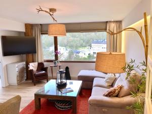 Apartamento con encanto Puerto de Navacerrada的休息区