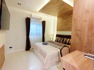 Villa la Ibiza 10mins to Walking Street客房内的一张或多张床位