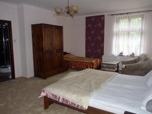 Dwór Komorowo客房内的一张或多张床位