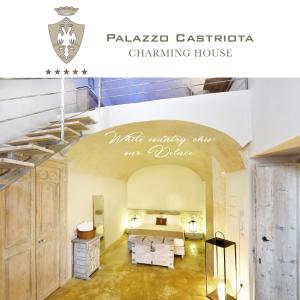 阿莱齐奥Palazzo Castriota的一间酒店客房,设有一张床和一个楼梯