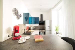 Appartement Le P'tit Dupont - OscarNewHome的休息区