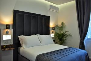 Antares Luxury Rooms客房内的一张或多张床位