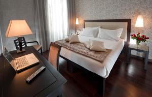 弗姆港C-俱乐部酒店客房内的一张或多张床位