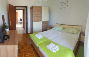 Cuzela-Papata Apartments客房内的一张或多张床位
