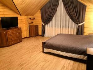 Усадьба Горный Алтай客房内的一张或多张床位