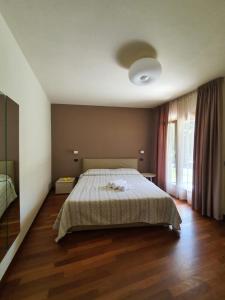 Sirmione Rosselli Apartments客房内的一张或多张床位