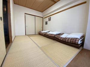 Residential Hotel Bevel Tokyo客房内的一张或多张床位