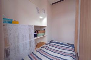 Taro's Hostel Minami Koshigaya客房内的一张或多张床位