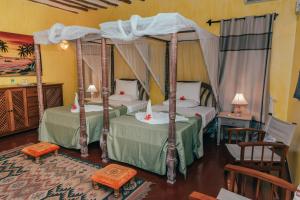 Hotel Villa Malindi客房内的一张或多张床位