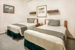 科阿韦拉萨尔蒂约总理酒店客房内的一张或多张床位