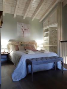 La Vierta Casa Rural Agroturismo客房内的一张或多张床位