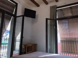 Hostal Radio Barcelona客房内的一张或多张床位