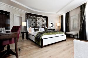 克莱纳玫瑰园酒店客房内的一张或多张床位