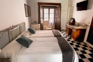 La Alberca de Fariñas客房内的一张或多张床位