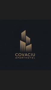 克卢日-纳波卡Covaciu aparthotel的建筑公司的标志