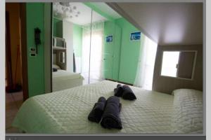 appartamento con vista Porto Recanati客房内的一张或多张床位
