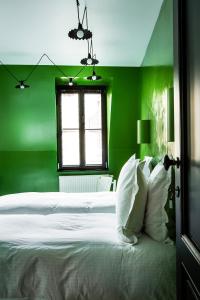 La Maison Haute guesthouse客房内的一张或多张床位