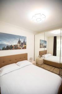 Covaciu aparthotel客房内的一张或多张床位
