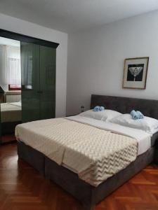 Apartmani Nada客房内的一张或多张床位