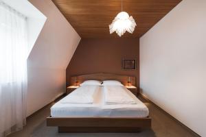 Residence Désirée Classic & Design客房内的一张或多张床位