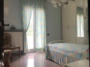 Villa alle Marixe客房内的一张或多张床位