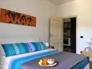 La casa di Giulia Apartment with air conditioning, wifi and private parking客房内的一张或多张床位