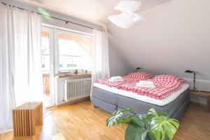 WÄLDER: Quartier Titisee客房内的一张或多张床位