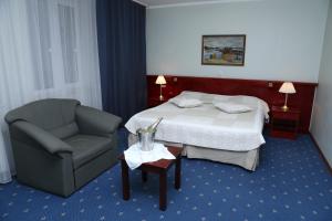德拉库恩酒店客房内的一张或多张床位