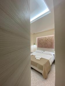 Vittorio Veneto Accomodation - Tropea city center客房内的一张或多张床位