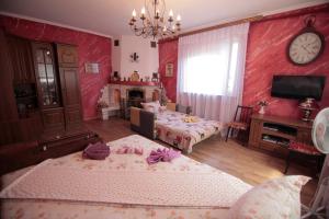Guest House Kamenny Dom客房内的一张或多张床位