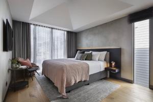 Hotel Fitzroy curated by Fable客房内的一张或多张床位