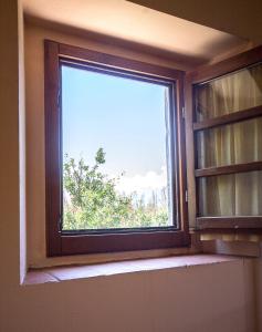 OlmiCasa di Zela的观景客房的窗户