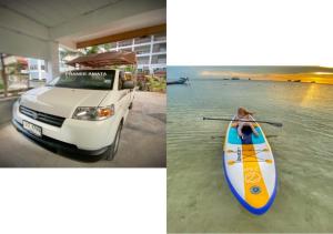 涛岛普拉尼阿马塔酒店的停在水边的一辆白色汽车和一艘皮划艇
