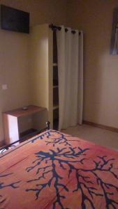 Auberge Le Baobab客房内的一张或多张床位