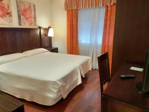 尤罗加洛酒店客房内的一张或多张床位
