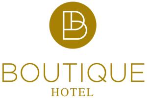 利梅尼Limeni Inn Boutique Hotel Adults only 12plus的写有字母b的酒店标志b